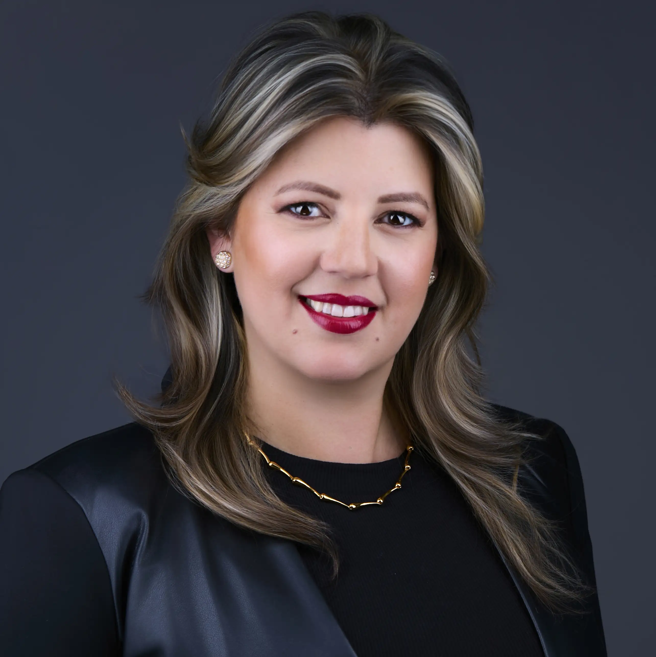 Professional headshot of a female executive in Queens, New York