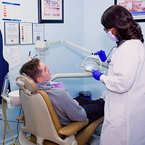 Dentist working with a patient during a professional branding