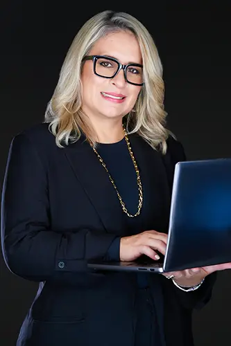 Professional businesswoman with laptop during an executive branding photography session in New York