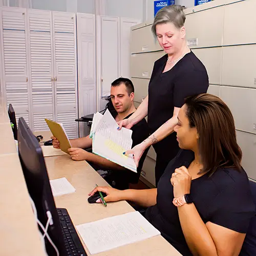 Professional team working together during an on-location business branding photography session