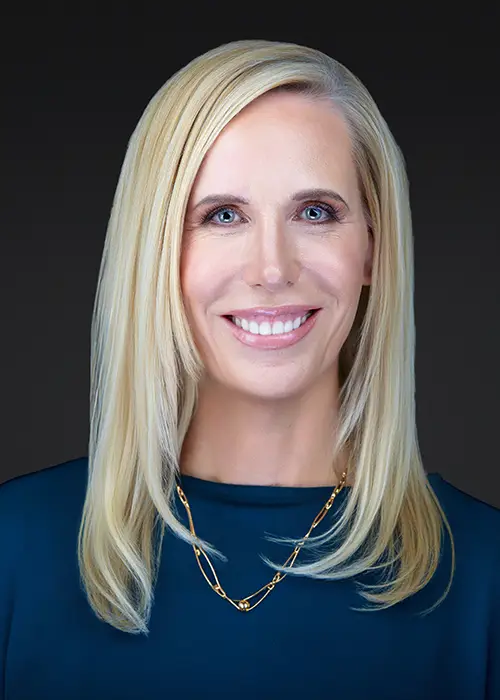 Professional headshot of a businesswoman photographed in Queens, New York